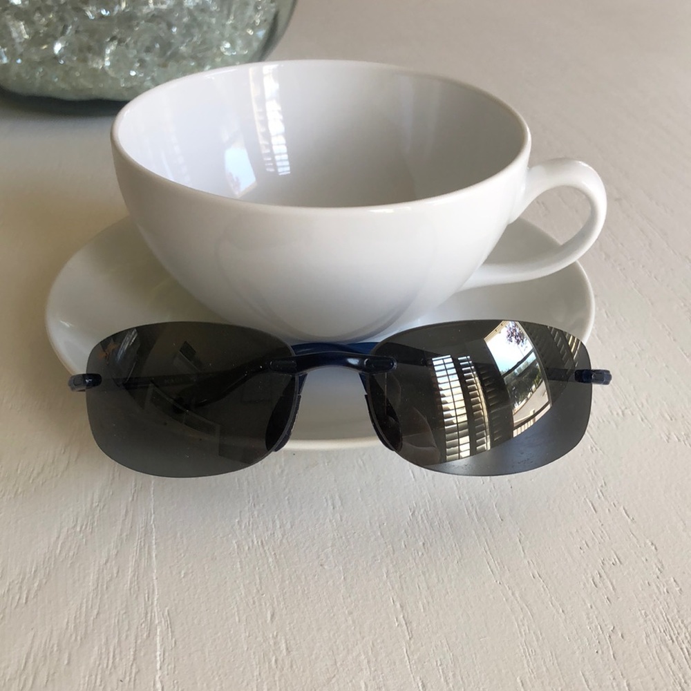 Maui, Jim unisex wraparound, sunglasses blue color.